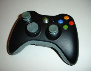 Cum se conectează un gamepad la Xbox 360?